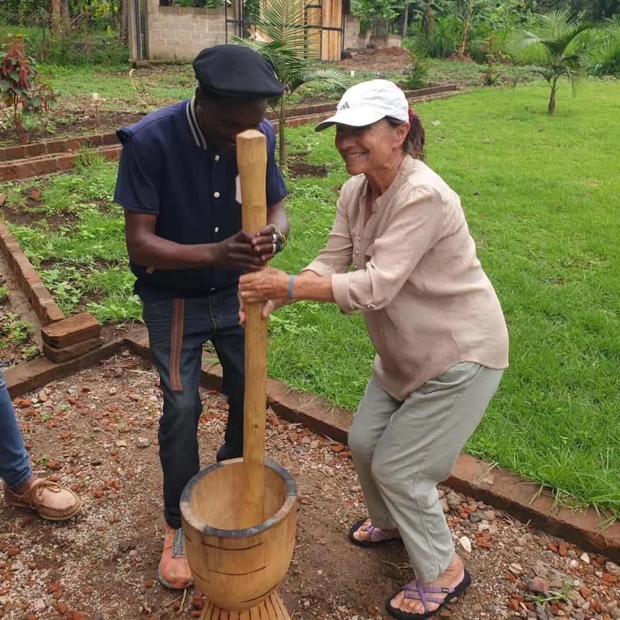 Arusha: Traditional Coffee Preparation(coffee tour) - Pounding dried beans with a wooden mortar