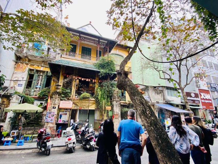 Coffee, History, and Architecture of the French Quarter - Hoan Kiem Lake and the city beyond colonial buildings