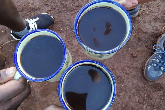 Coffee Tour Experience - Pounding the beans with a wooden mortar