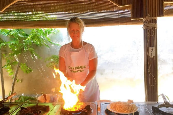 Experience Making & Tasting Vietnamese Coffee in Hoi An - Watching the beans roast before making coffee