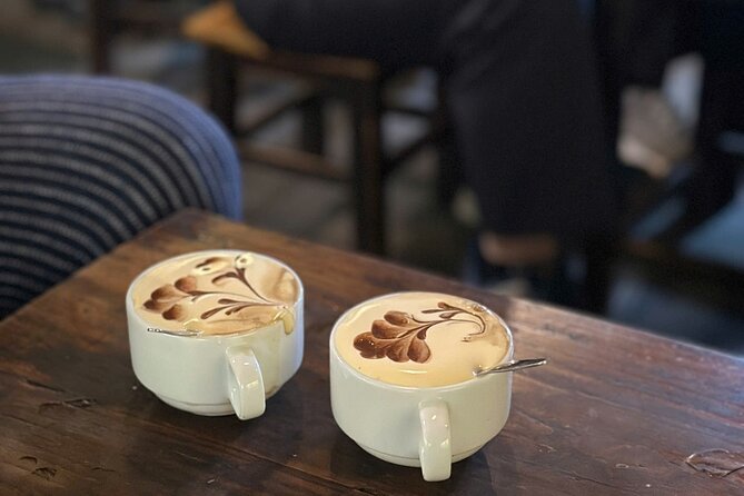 Hanoi Coffee Culture Tour: Sip, Taste & Hear Local Stories - Passing the Hanoi Opera House