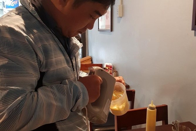 Hanoi Egg Coffee Making Course - Making the thick topping into coffee art