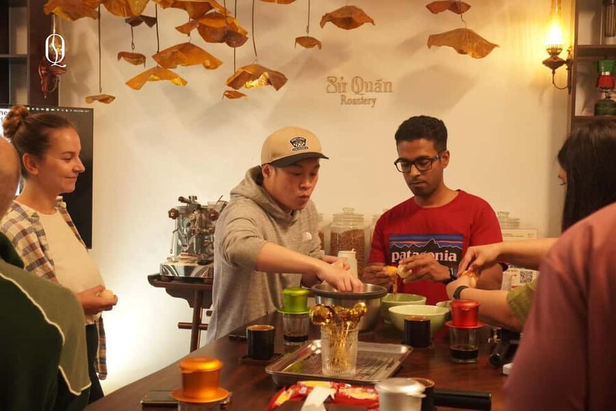 Hanoi: Hands-On 5 Vietnamese Coffees & 3 Local Wines Tasting - Arriving with herbal tea and a local snack