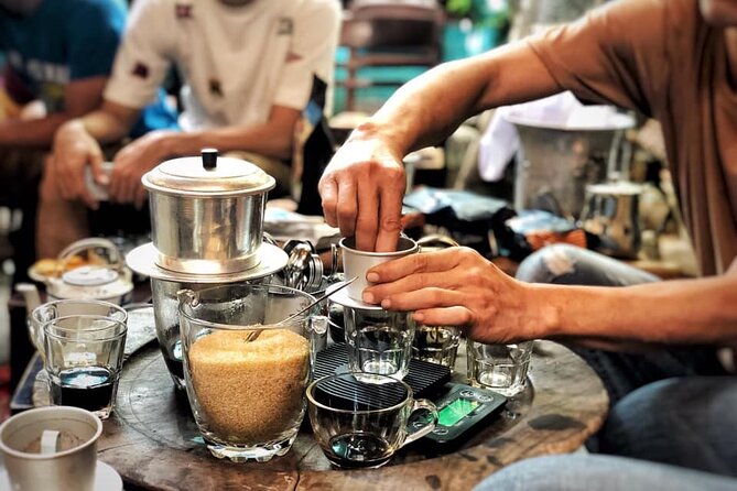 Hanoi Private And All Inclusive Coffee Lovers Tour in Vietnam - Walking through the Old Quarter between cafe stops