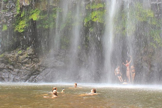 Materuni Waterfalls, Coffee and Village Full Day Tour - Cooling off beneath the waterfall