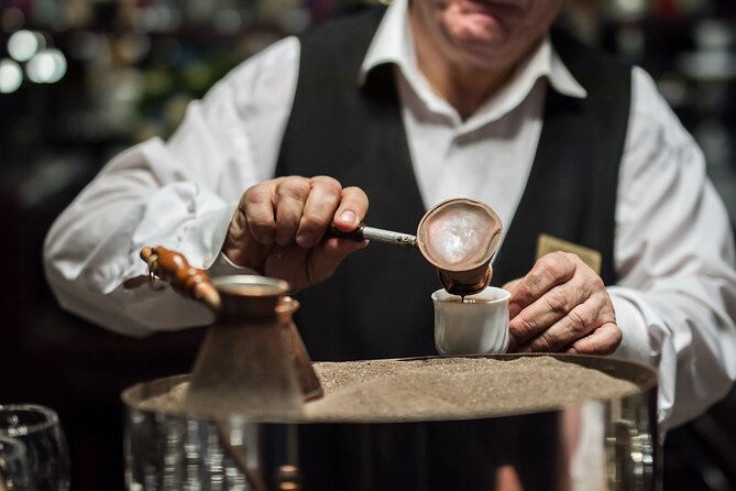 Sand-Brewed Turkish Coffee Workshop in Cappadocia - Grinding the coffee and learning the story